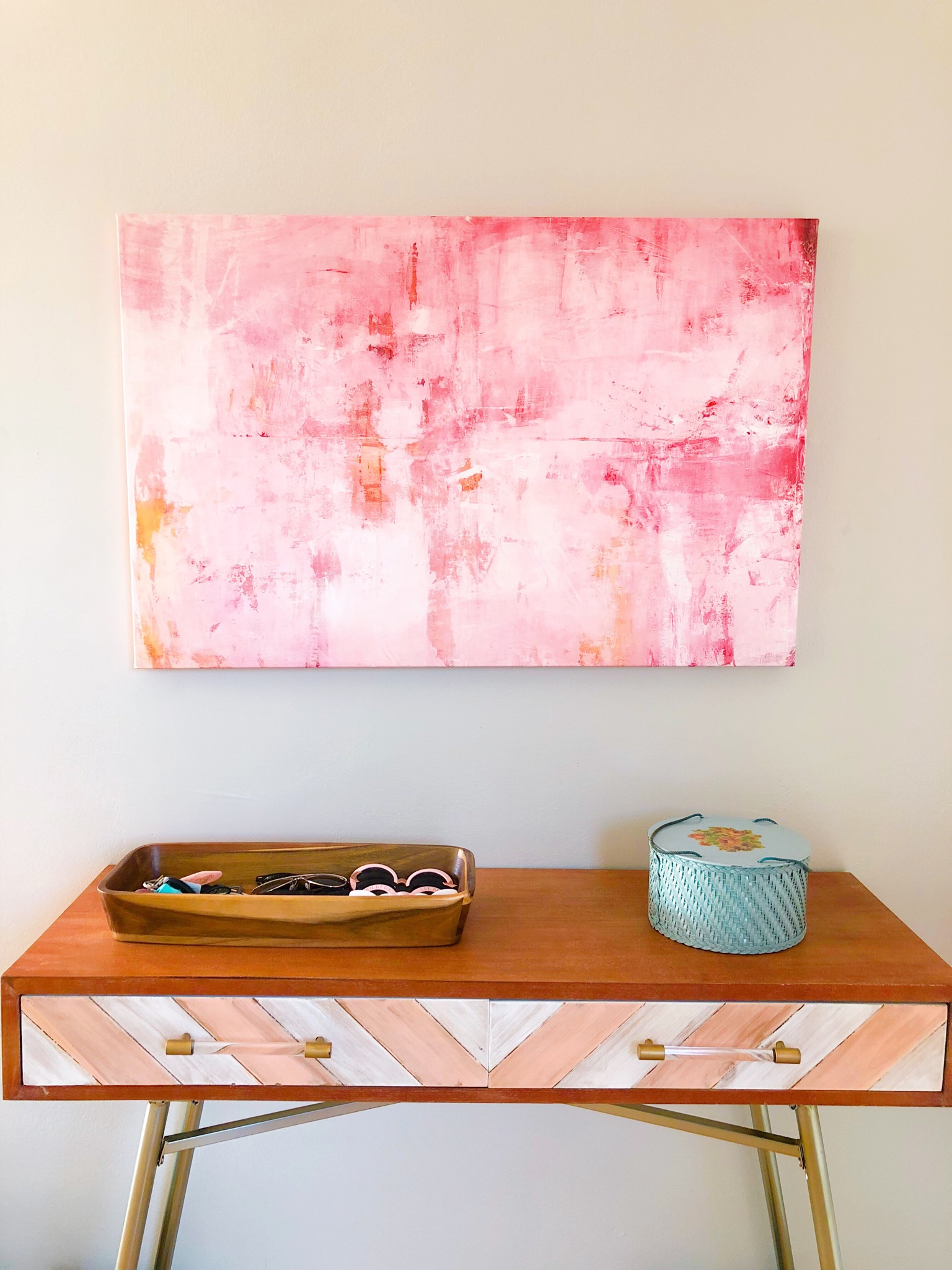 Michelle Oppenheimer's Pink Mirrors above Jenna's end table