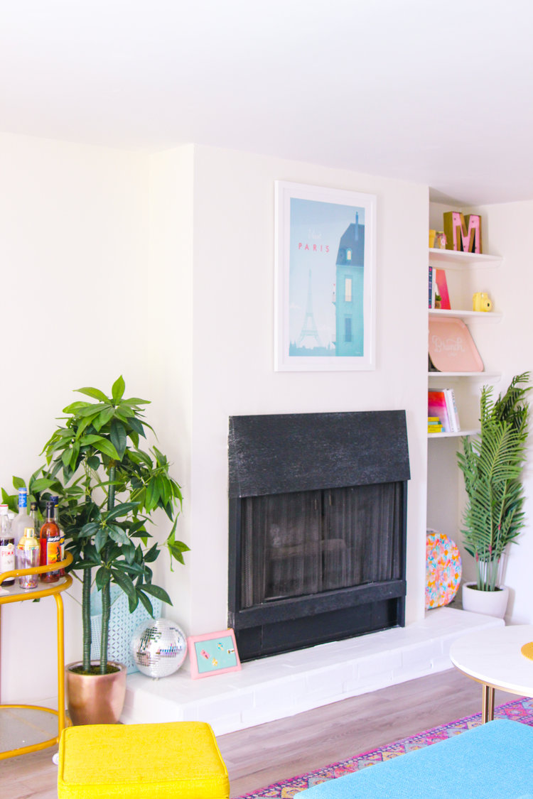 Henry Rivers' Paris print above Cortney's fireplace