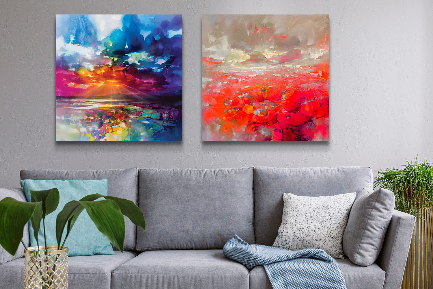 A grey living room with two canvas art prints by Scott Naismith above a grey sofa: "Sun's Energy" and "Molecular Bonds"