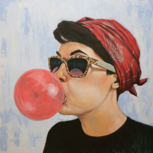 a woman with her hair in a red bandanna wearing sunglasses while blowing a bubble with gum