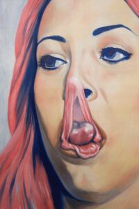 a portrait of a woman with pink hair who just had a bubble of gum collapse over her mouth and nose