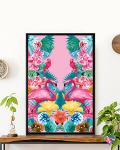 a bright pink symmetrical print featuring flowers, flamingos, and parrots