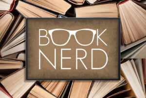 the words "book nerd" in white with the two o's in book being made from a pair of glasses