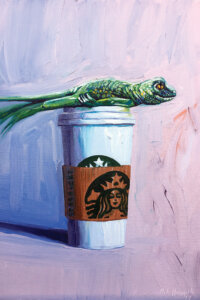 a green lizard planking on top of a venti starbucks cup