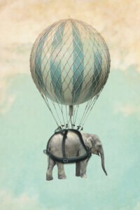 an elephant wearing a harness connected to a large balloon that's floating in the sky