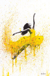 Female dancing in yellow splattered dress on a white background