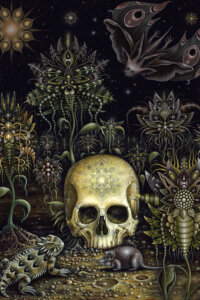 Skull with symmetrical pattern on front laying on the ground surrounded by an iguana, a rat, a bat, and ornate flowers