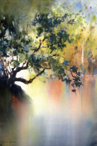 Abstract multicolor landscape partially showing branches on a tree backlit by the sun