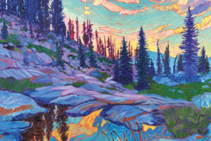 “Mountain Revelry” by Jessica Johnson shows pine trees under a blue, pink, and yellow sky that’s casting light on the water.