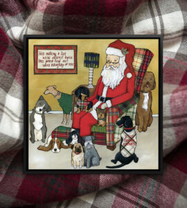 Santa sitting on a plaid chair with a group of dogs sitting around him