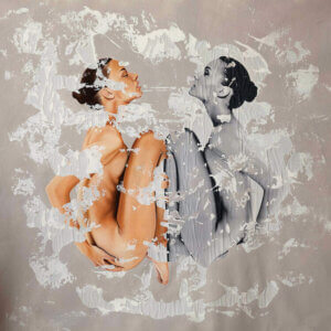 “Serenitatem” by Raúl Lara shows two women, one in color and one in black and white, mirroring one another in a fetal-like position with their hands on their back.