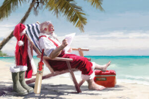 Santa Claus sitting on a chair on the beach barefoot reading a list