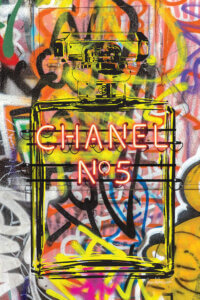 A colorful graffiti image of a Chanel No. 5 perfume bottle on a concrete-like texture