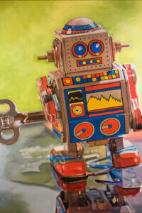 “Mini Robot” by Andrea Alvin shows a windup toy robot that has red, blue, and yellow detailing on its copper body.