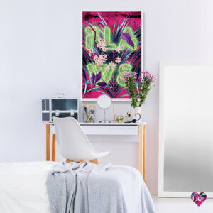 Neon green text that says "Flaws" over a pink, purple and blue tropical background, framed in white over a vanity table in a bedroom