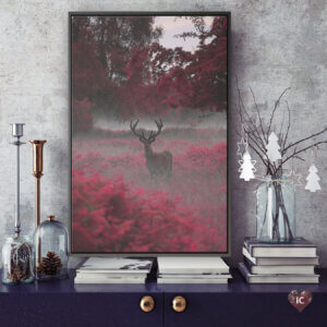“Strawberry Stag I” by Max Ellis shows a stag standing in red fields under red trees.