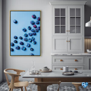 “Blueberries” by ETTAVEE shows blueberries decorated with small white and pink accents against a blue background.