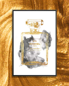 “Perfume Bottle, Gold &amp; Grey” by Amanda Greenwood shows a No. 5 Chanel perfume bottle in gold with gray cloud-like figures behind it.