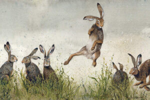 An illustration of six brown rabbits in a field of tall grass with one jumping into the air