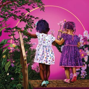 Two black toddler-aged girls wearing colorful dresses holding hands and walking through gold circle bordered with flowers