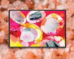 Candy by Jane Monteith shows a cluster of multi-colored rocks in pink, orange, red, yellow, white, and black