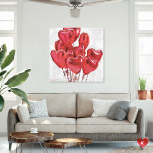 Spread The Love by Teddi Parker shows a group of ten red heart-shaped balloons against a white background