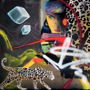 "Wild Hearts" shows a leopard and a woman's face combined with spray painted lines and abstract shapes.