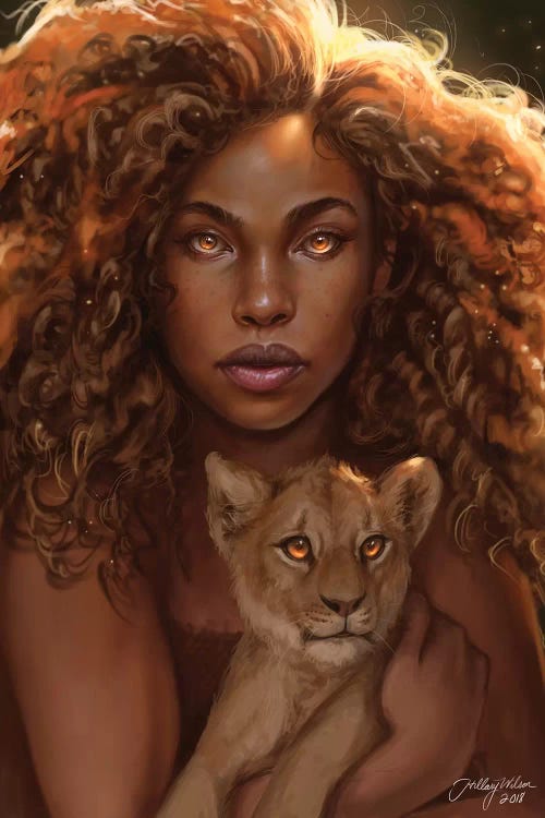 black woman holding a lion cub