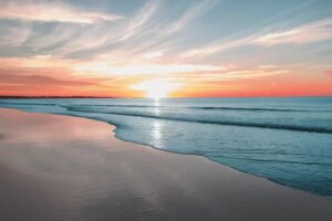 Sunrise over beach by iCanvas artist Marcus Prime