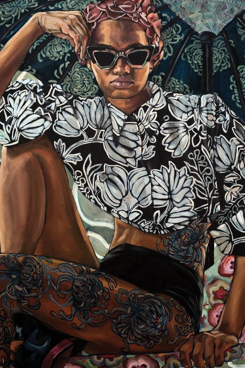 portrait of a black woman with tattoos on her legs and side with a floral top on by iCanvas artist Belinda Eaton