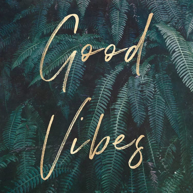 Wall art of words good vibes in gold against a green fern background by Nature Magick