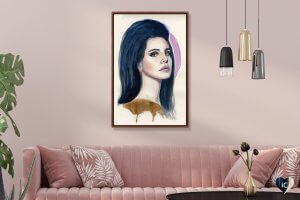 Wall art of Lana Del Rey by iCanvas artist Sean Ellmore above pink couch