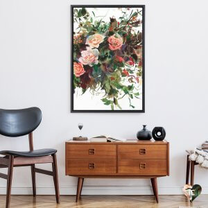 Framed floral wall art by Gosia Gregorczyk above chair and table