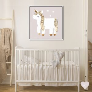 Neutral nursery featuring iCanvas wall art of a sleepy white unicorn below three stars by Victoria Barnes