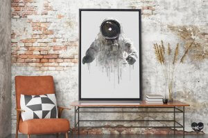 Brick wall with black and white spaceman art with paint dripping from body of astronaut by iCanvas artist Daniel Taylor