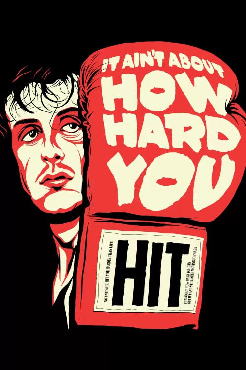 Red and black pop culture print of Rocky Balboa holding up glove that says “It Aint About How Hard You Hit” by Butcher Billy