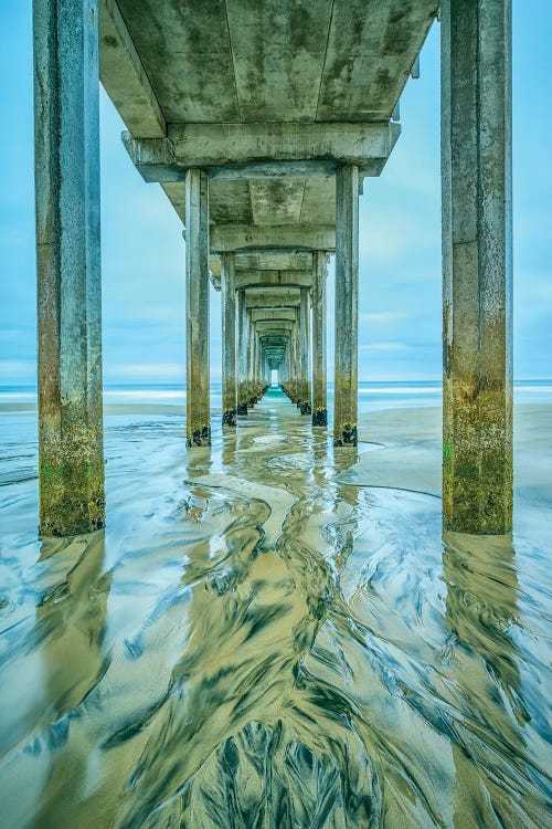 Beach photography of the view of ocean from underneath a dock by new iCanvas artist Joseph S. Giacalone