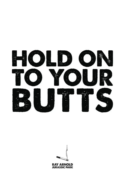 White wall art with Jurassic Park quote “hold on to your butts” in black font by new iCanvas artist Simon Lavery