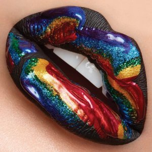Pride month art of lips with rainbow paint over them by iCanvas artist Vlada Haggerty