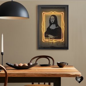Framed wall art of Mona Lisa dripping in black point outlined in gold neon frame by iCanvas artist Octavian Mielu