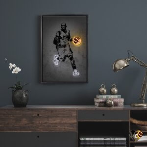 Framed wall art of black and white image of Kobe with neon white shoes dribbling orange neon basketball by Octavian Mielu