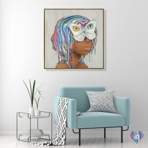 Lowbrow art of a black girl with rainbow paint spilling off head and white butterfly over face by iCanvas artist Camilla d’Errico
