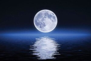 Moon wall art of full moon over ocean with reflection in water by icanvas artist Bess Hamiti