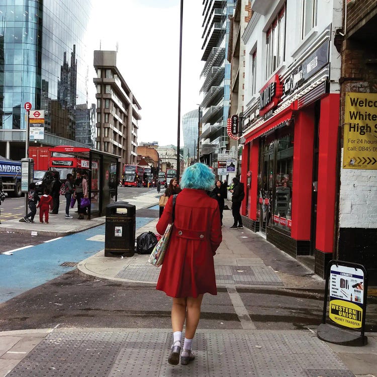 Authentic photography of woman in red coat and blue hair walking on city street by new icanvas creator Amadeus Long