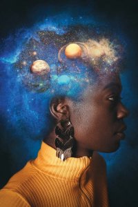 sci-fi art of Black woman with outer space as her afro by 5 questions with featured iCanvas artist Marischa Becker