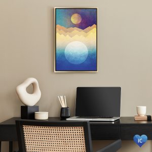 Framed art above desk of sun, moon and mountains in blue and yellow colors dogs can see by Elisabeth Fredriksson