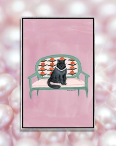 Black cat sitting on a pink loveseat wearing a string of pearls.