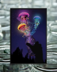 A hand letting three neon jellyfish out of a jar at night.