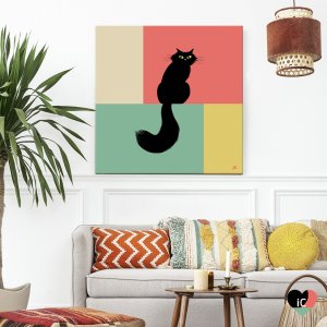 Black cat with a long tail against a red, tan, yellow, and green background.