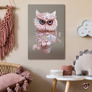 An owl with intricate cutout floral designs